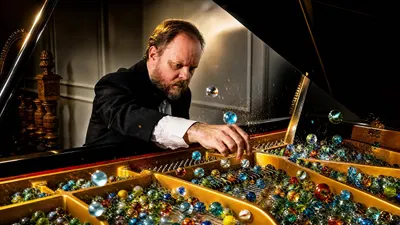 Playing a Piano with Marbles