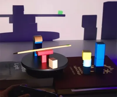 Playing a Video Game with Real Shadows